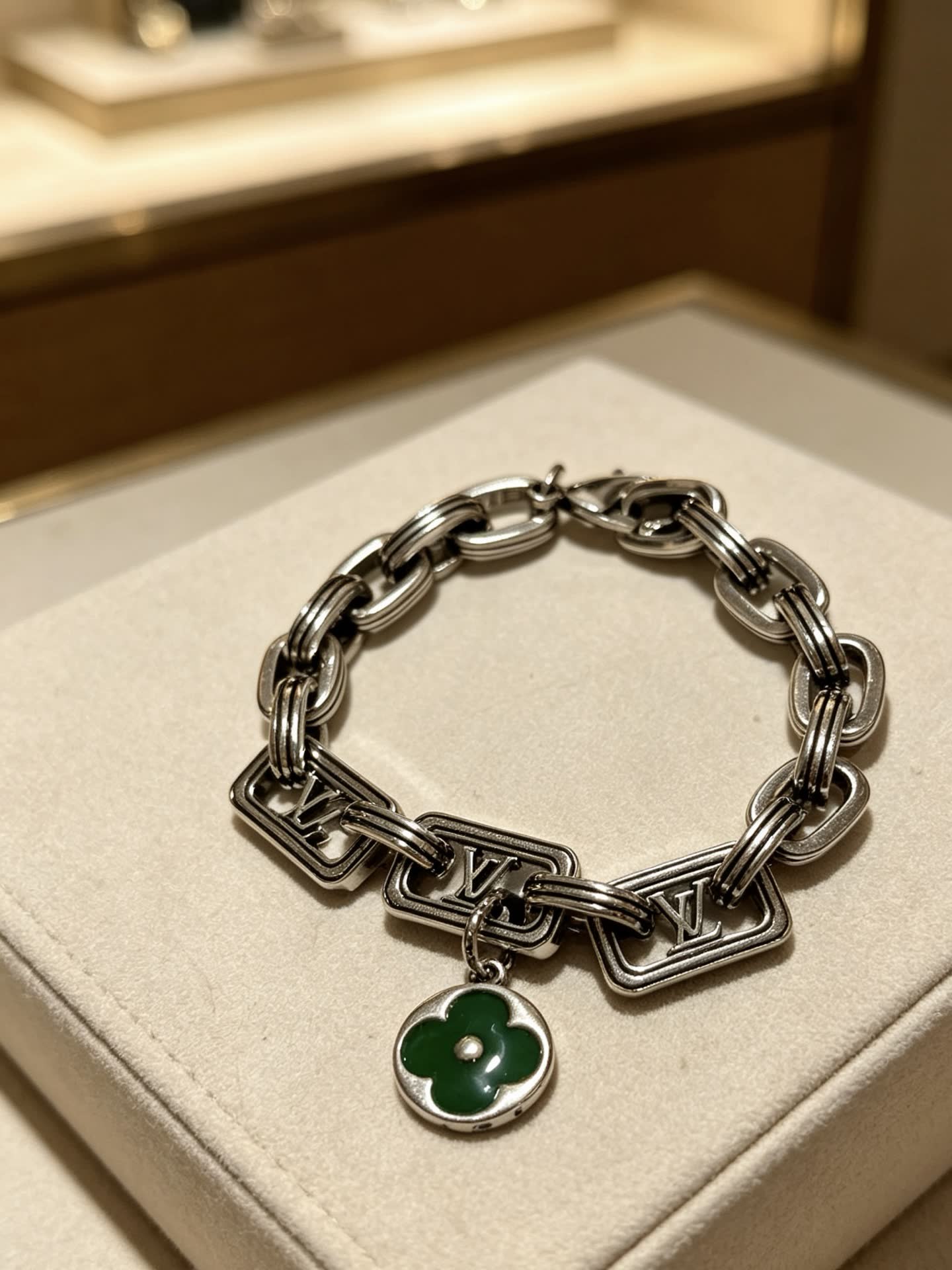 Louis Vuitton Silver Bracelet with Green Clover Charm